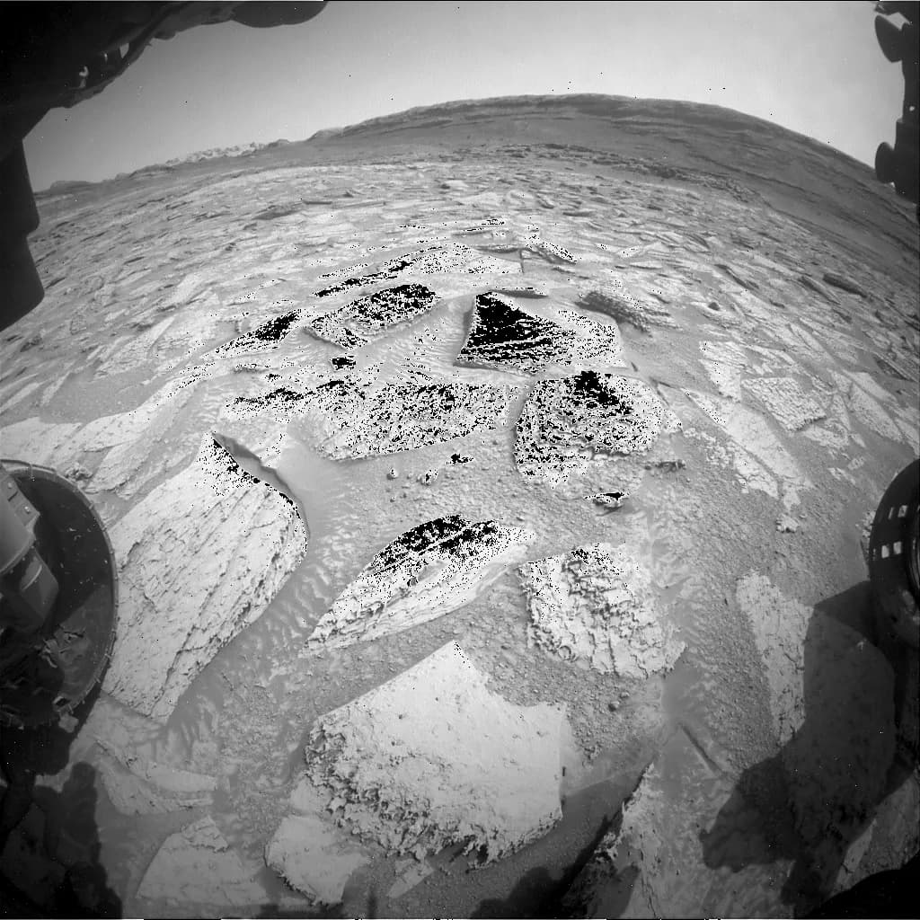 Curiosity drills rock that sticks to drill sleeve