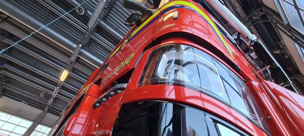 Fire truck photographed from below in vehicle bay