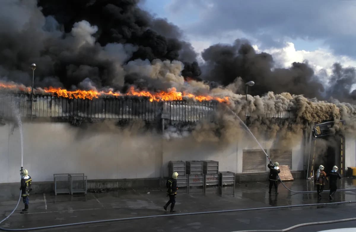 Fire kills 41 on New Year's Eve as storms and violence hit Europe